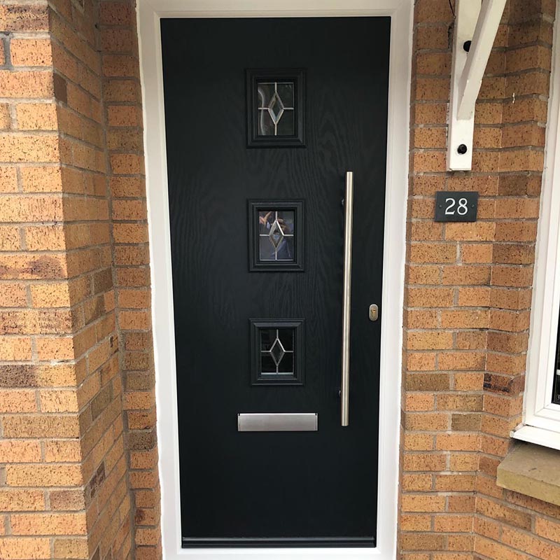 Black uPVC door at number 28