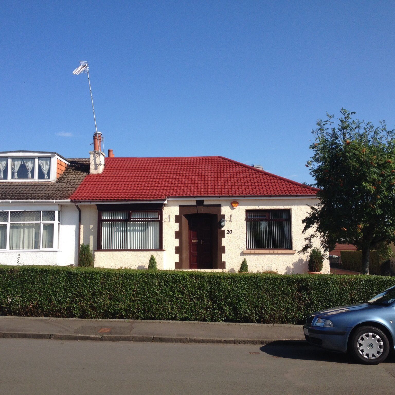 Revolutionary Roof Coatings with red sprayed roof tiles